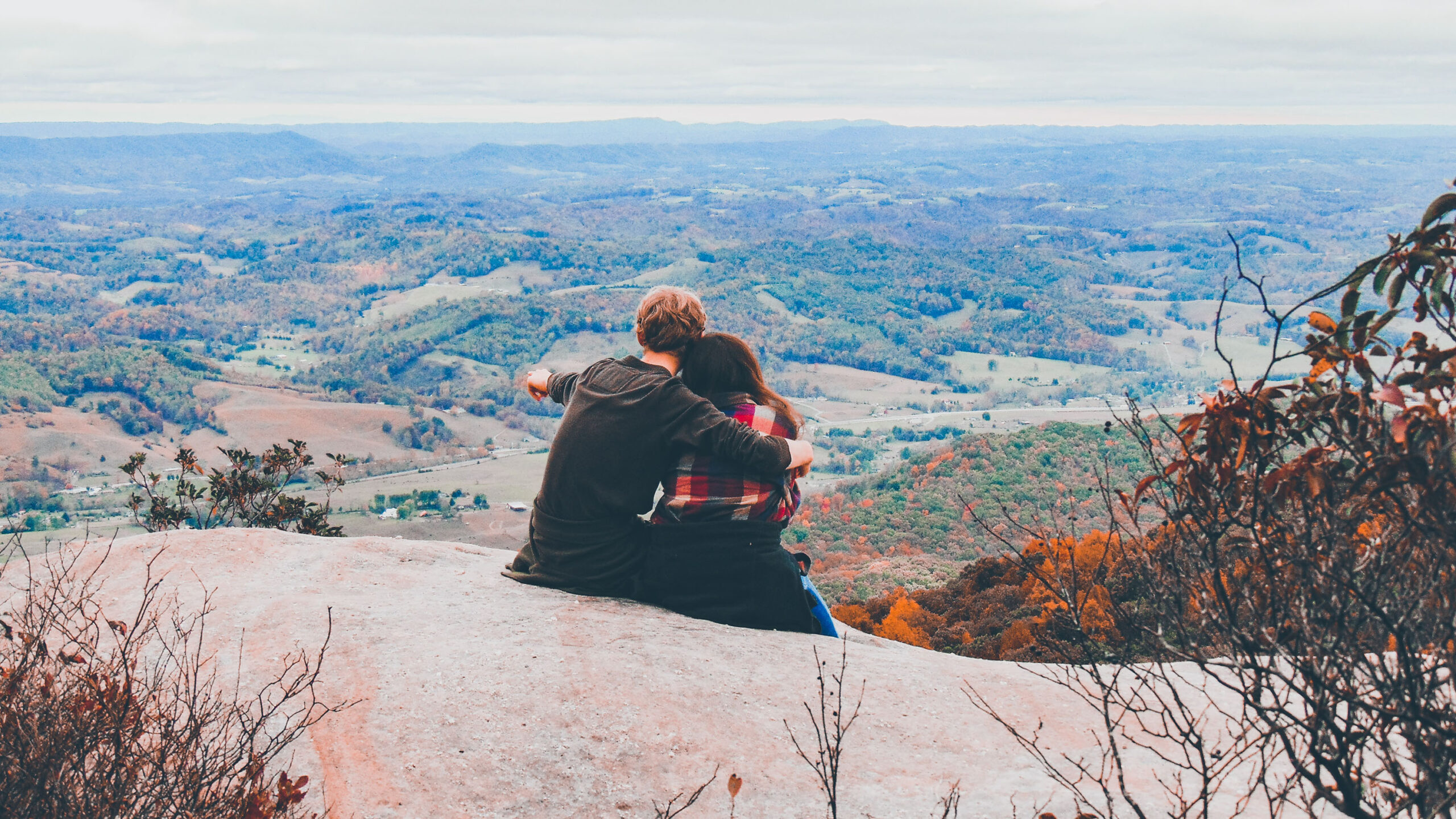 Picture of couple sitting on top