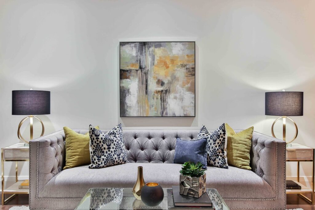 Picture of pillows on Sofa with wall