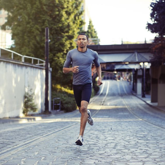 Picture of Man Running on Road - Cardio Exercise