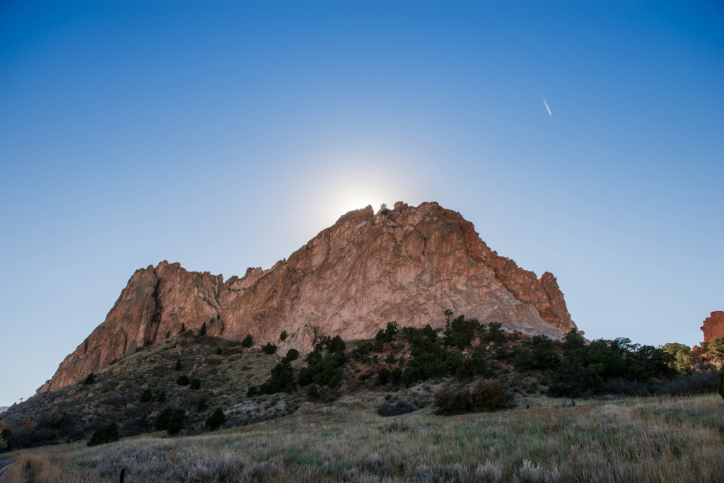 Picture of brown mountain near trees -- Denver Mountain Parks